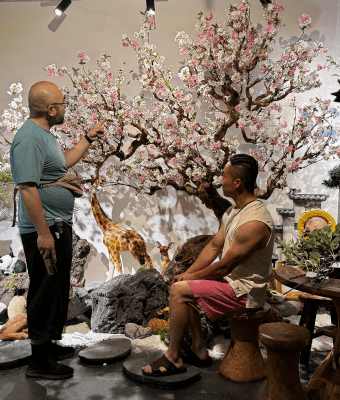 Craftsmen working on artificial tree